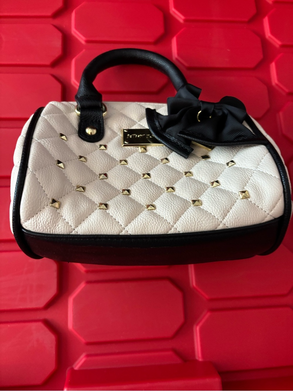 Betsey Johnson White Quilted Mini Satchel with Black Trim and Gold Studs